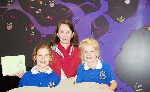 Georgia Waples with Warwick West State School librarian Sue Higgins and Sophie Follett. Georgia Waples with Warwick West State School librarian Sue Higgins and Sophie Follett.